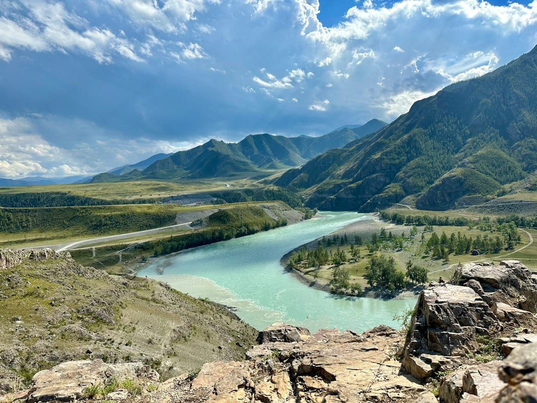 Altay grasslands with yurts and mountains
