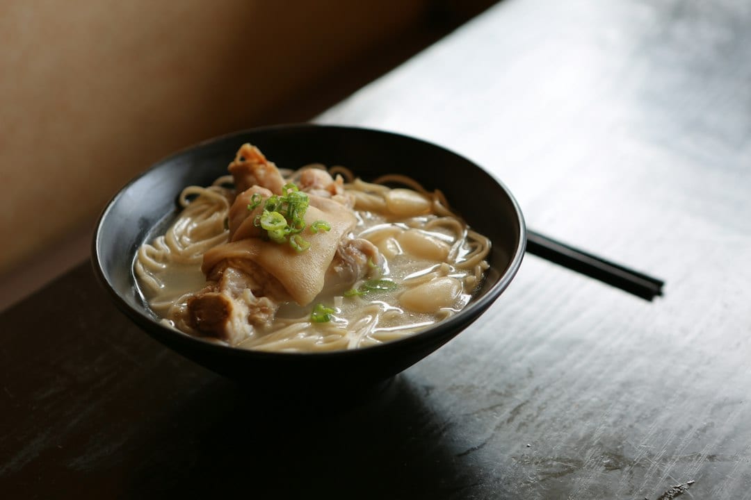 Hand-pulled Lanzhou beef noodles in a black bowl