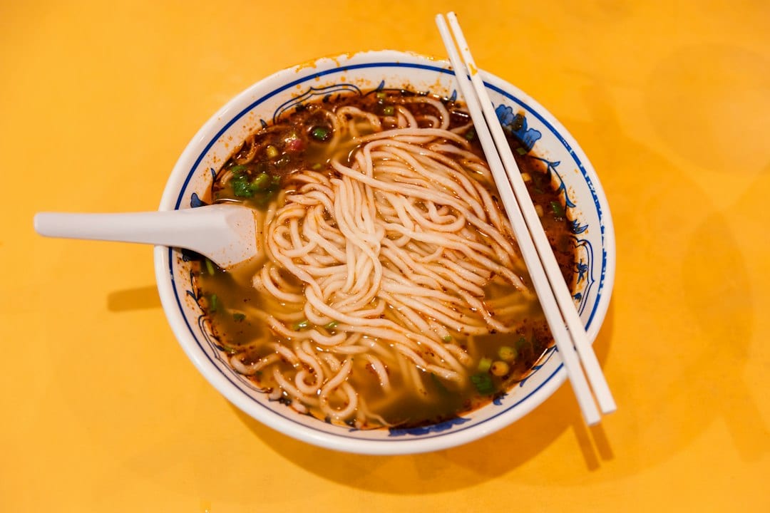Dan dan noodles in a ceramic bowl