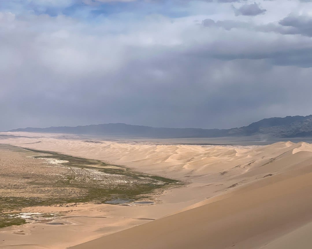 Rolling golden sand dunes in the Gobi Desert