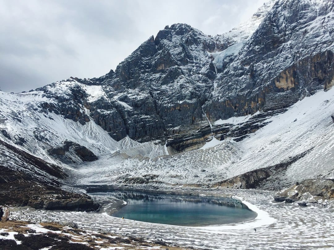 Snow-capped mountains and alpine lake in western Sichuan