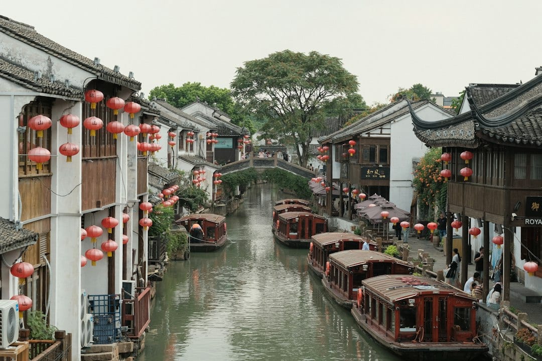 Suzhou ancient canal water town with traditional boats