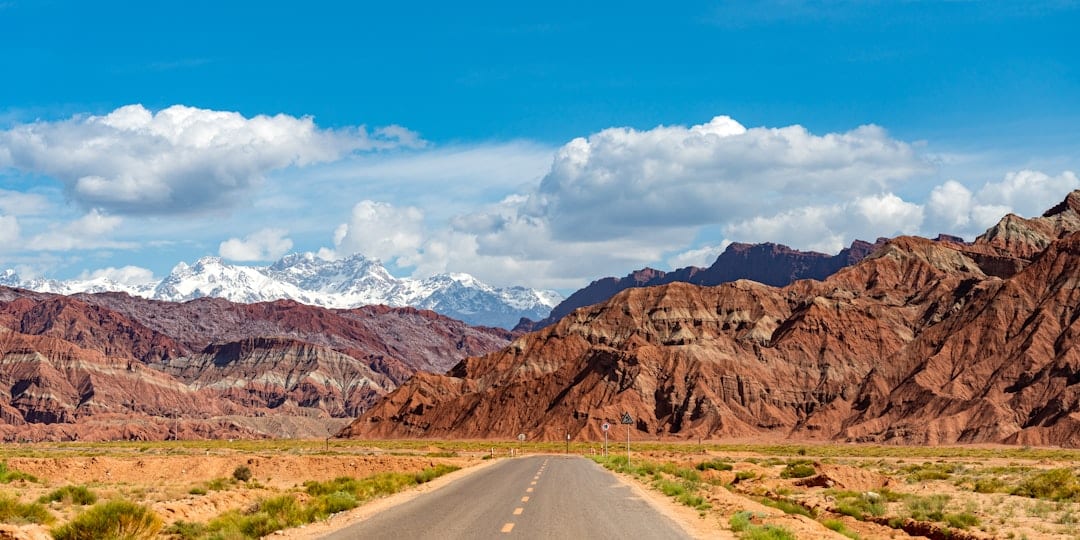 Desert road through Xinjiang landscape