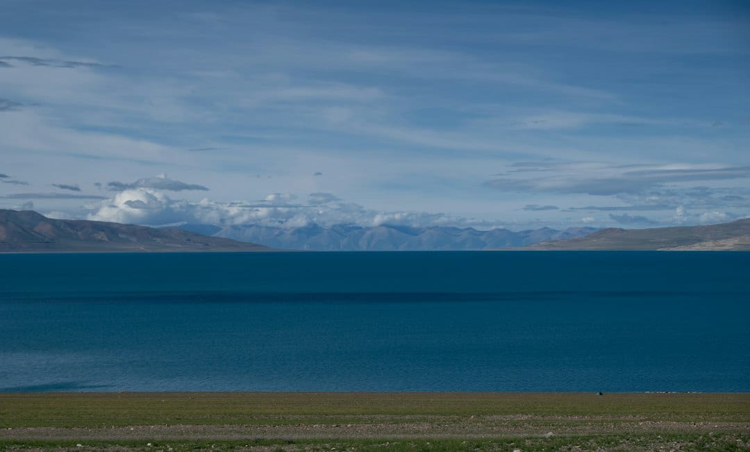 Yamdrok Lake stretching toward distant mountains